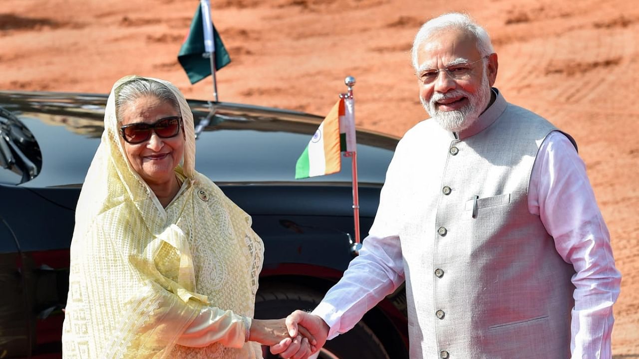 PM Narendra Modi (right) with Bangladeshi counterpart Sheikh Hasina (left). Credit: PTI Photo