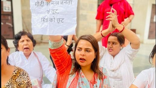 Several Delhi Pradesh Mahila Congress members including the wing's chief Amrita Dhawan were detained during the protest. Credit: Twitter/@INCIndia