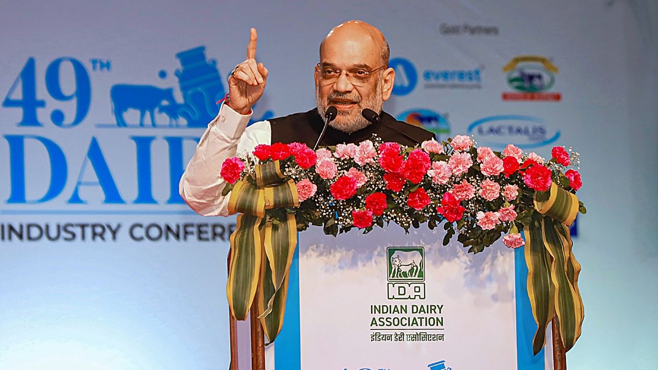 Union Minister for Home Affairs and Cooperation Amit Shah addresses the 49th Dairy Industry Conference organized by Indian Dairy Association, in Gandhinagar, Saturday, March 18, 2023. Credit: PTI Photo