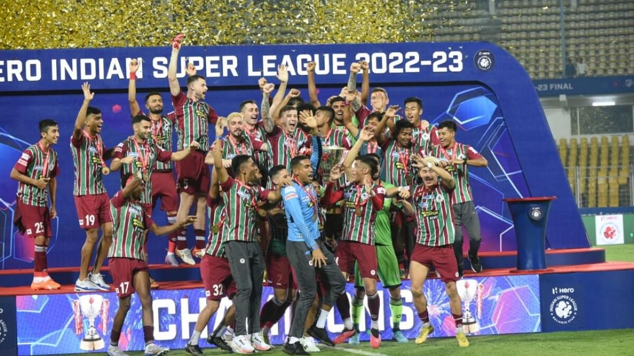 ATK Mohun Bagan lift the ISL trophy. Credit: IANS Photo