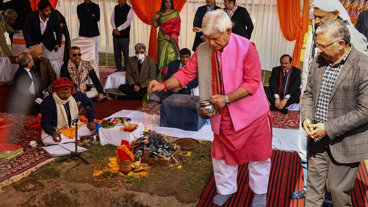 Jammu and Kashmir Lt Governor Manoj Sinha performs 'Bhumi Pujan' during foundation stone laying of the mall by Dubai's Emaar Group. Credit: PTI Photo