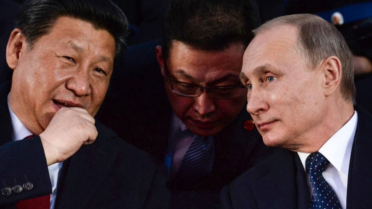File photo of China's Xi Jinping(L) and Russia's Vladimir Putin. Credit: AFP
