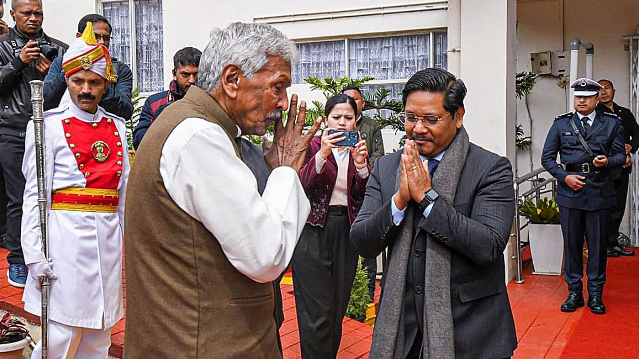 Meghalaya Governor Phagu Chauhan being greeted by Chief Minister Conrad Sangma as he arrives at the State Assembly. Credit: PTI Photo