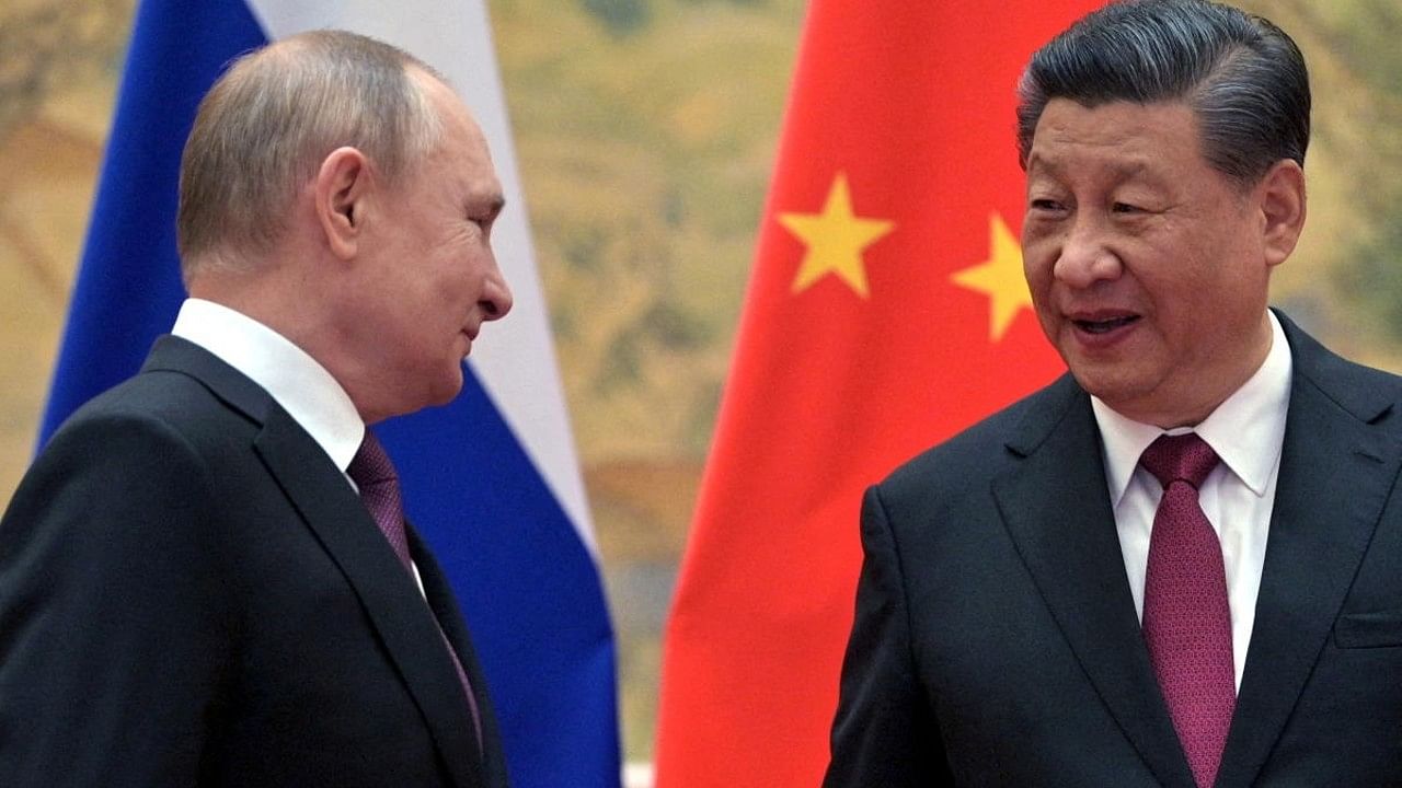Russian President Vladimir Putin (L) with Chinese President Xi Jinping (R). Credit: Reuters File Photo