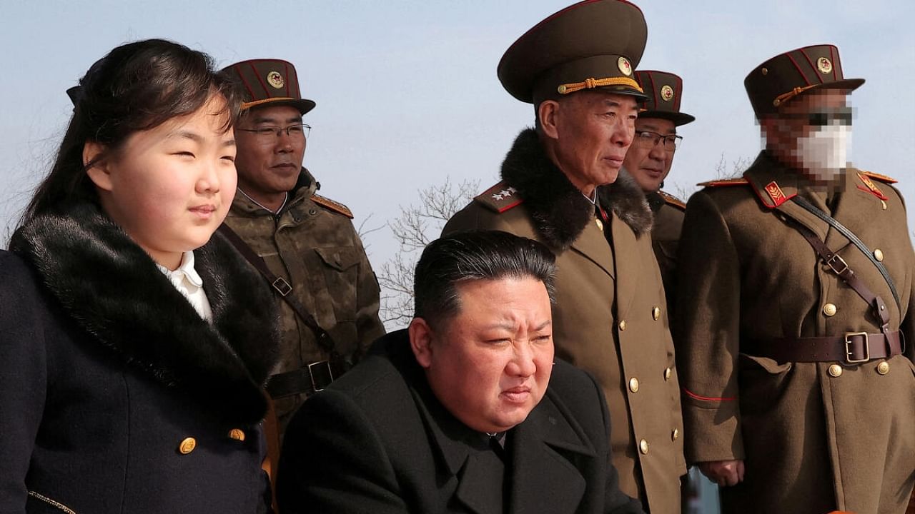 North Korean leader Kim Jong Un and his daughter Kim Ju Ae watch a missile drill at an undisclosed location. Credit: KCNA via Reuters