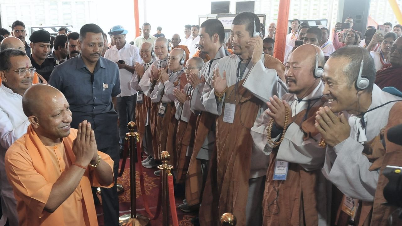 Uttar Pradesh Chief Minister Yogi Adityanath during a felicitation programme for South Korea's Jogye Buddhist pilgrims on the success of their pilgrimage, in Lucknow, Wednesday, March 22, 2023. Credit: PTI Photo