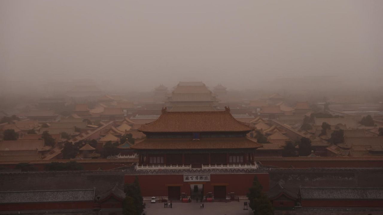 A view of the Forbidden City, as the city is shrouded in smog amid a sandstorm, in Beijing, China March 10, 2023. Credit: Reuters Photo