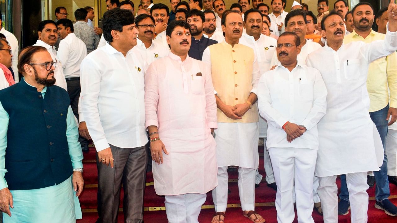 Opposition members protest after Congress leader Rahul Gandhi's disqualification from Parliament, during the Budget Session of Maharashtra Assembly, in Mumbai, Friday, March 24, 2023. Credit: PTI Photo