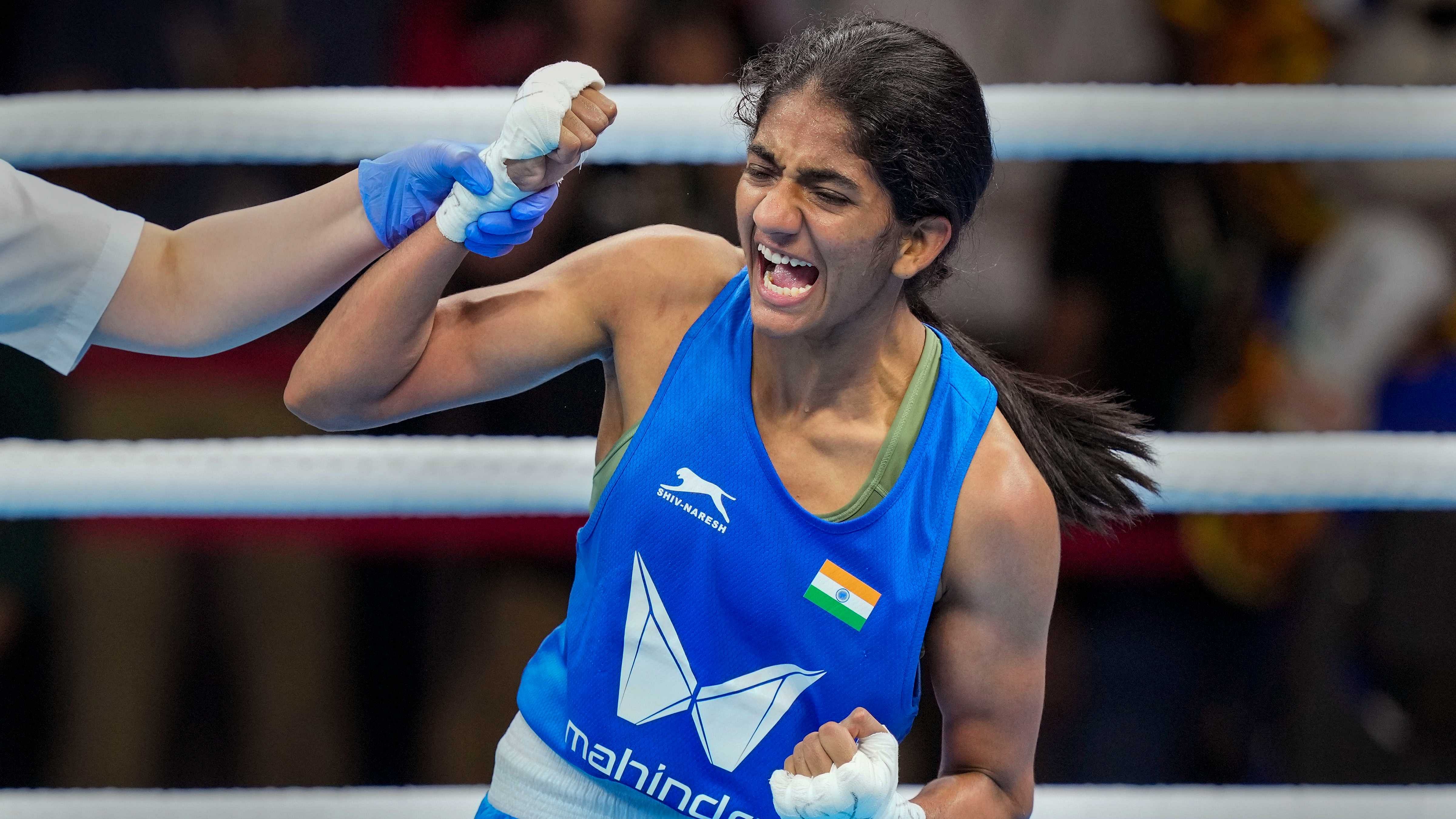 Nitu reacts after winning her 45-48kg category semifinals match against Kazakhstan's Alua Balkibekova at the 2023 IBA Women's Boxing World Championships. Credit: PTI Photo