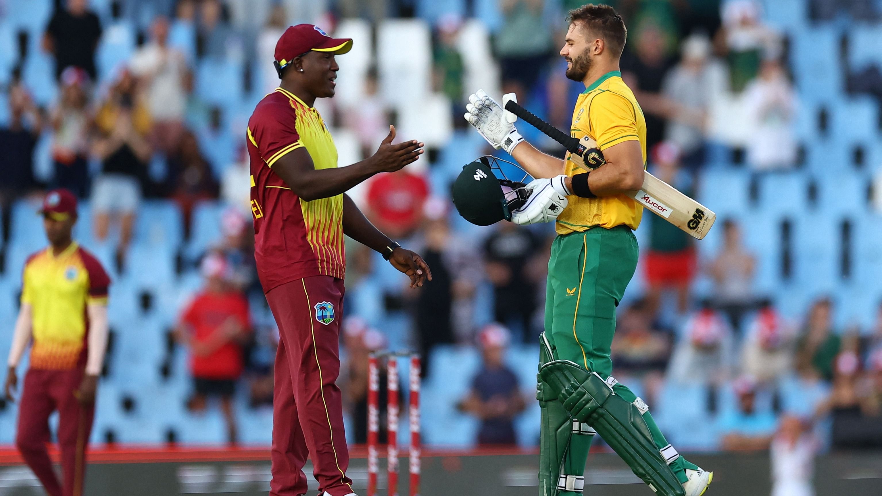 South Africa's Aiden Markram with West Indies' Rovman Powell at the end of play. Credit: Reuters Photo