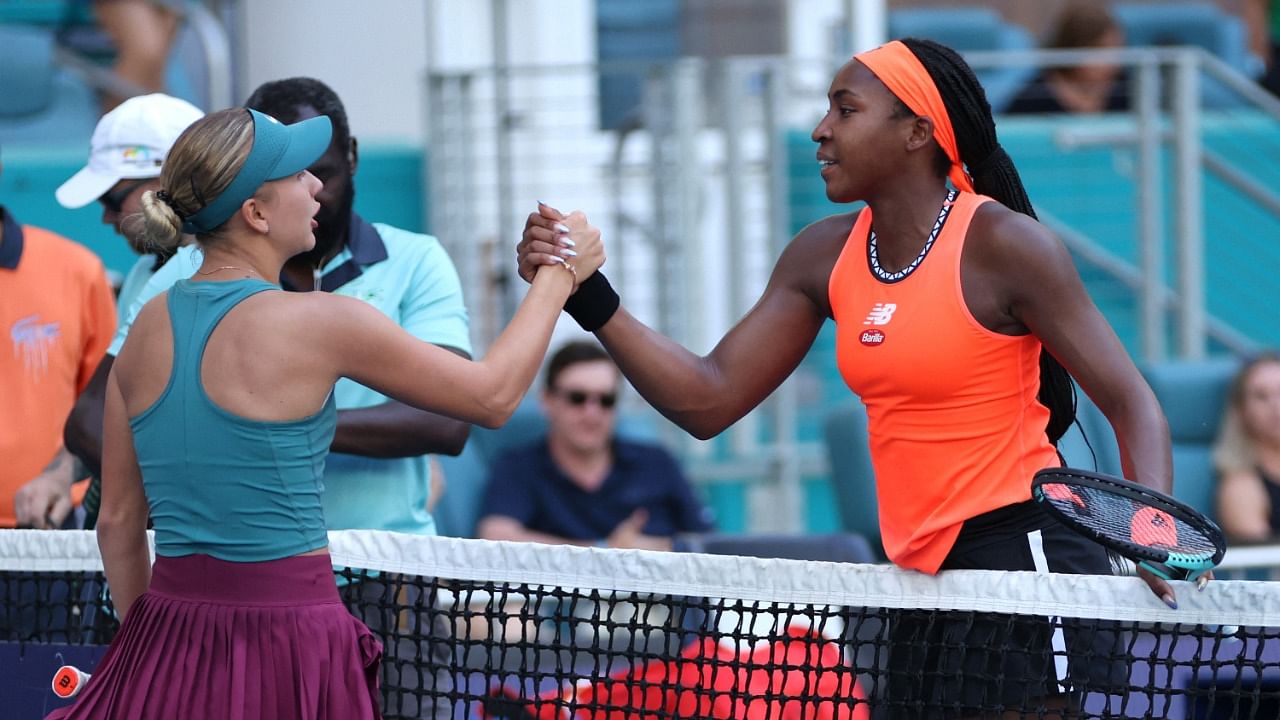 Anastasia Potopova (L) shakes hands with Coco Gauff (R) after their match on day six of the Miami Open. Credit: AFP Photo