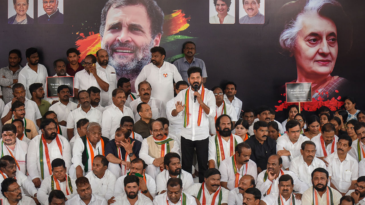 Telangana Pradesh Congress Committee (TPCC) President A Revanth Reddy speaking in the protest. Credit: PTI Photo