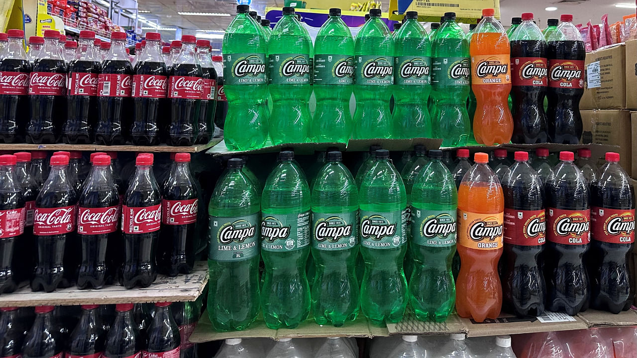 Bottles of Campa Cola and Coca Cola are displayed at a Reliance Smart supermarket in Mumbai. Credit: Reuters Photo