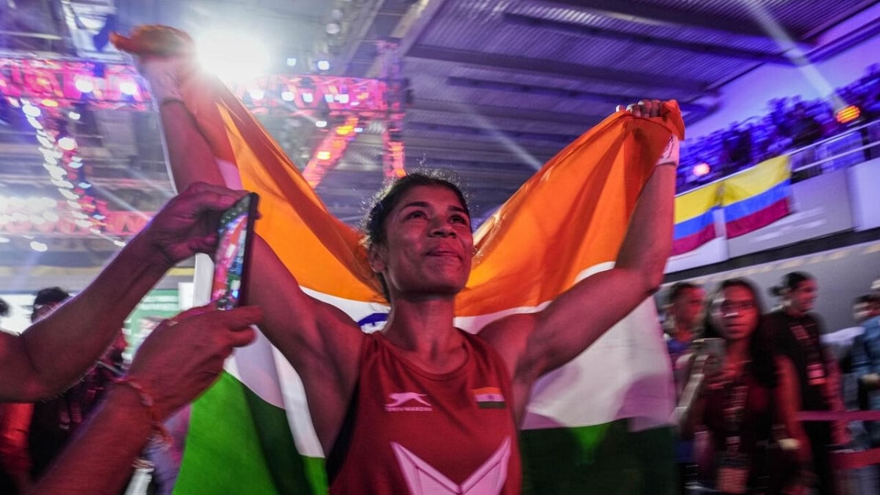 Nikhat Zareen celebrates her victory over Vietnam’s Nguyen Thi Tam in 50 kg finals at the 2023 IBA Women’s Boxing World Championships, in New Delhi, Sunday, March 26, 2023. Credit: PTI Photo