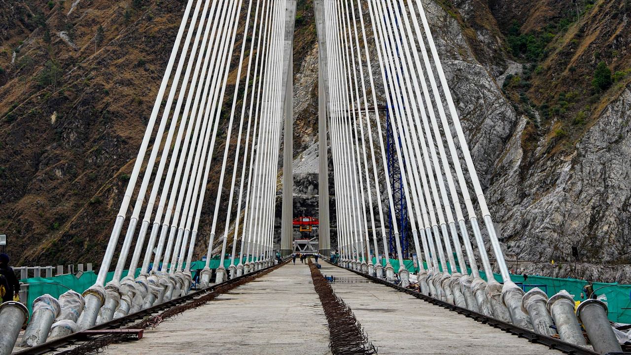 Underconstruction Anji Khad bridge, India's first cable-stayed railway bridge. Credit : PTI Photo