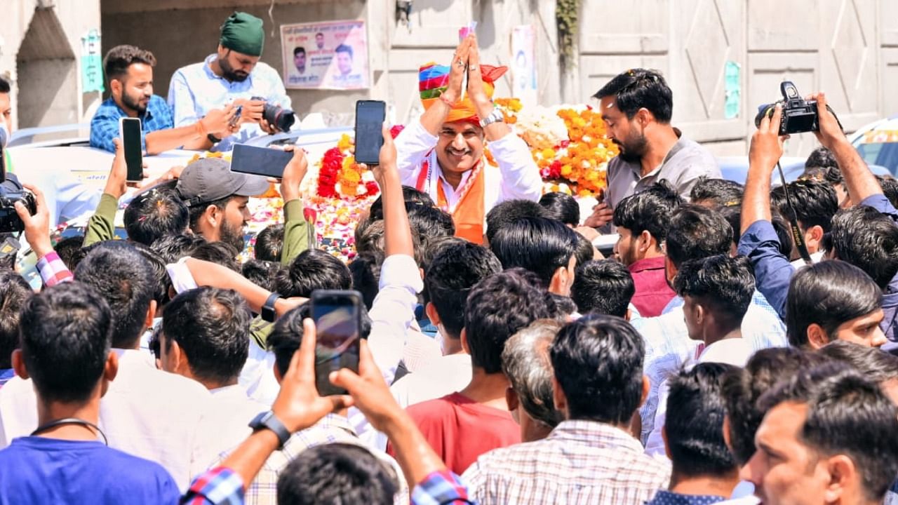 Joshi was welcomed by BJP workers with garlands and a lot of celebration. Credit: Twitter / @BJP4Rajasthan