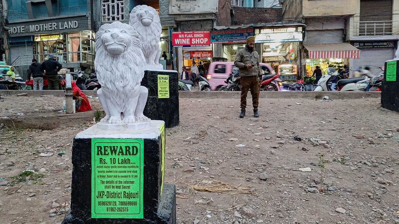 Posters of Rs 10 lakh reward pasted at different locations in Rajouri district. Credit: PTI File Photo