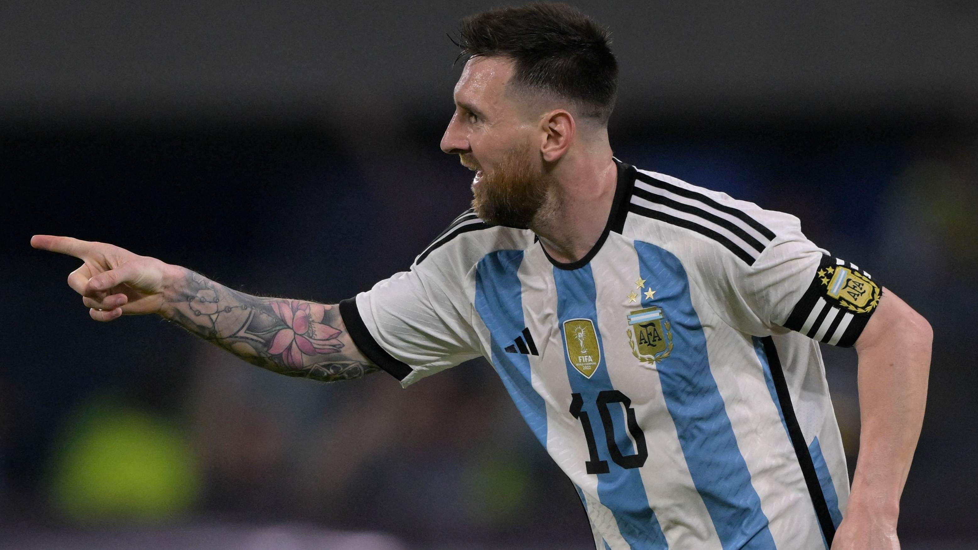 Argentina's forward Lionel Messi celebrates after scoring his team's first goal -his 100th with the national team- during the friendly football match between Argentina and Curacao at the Madre de Ciudades stadium in Santiago del Estero, in northern Argentina, on March 28, 2023. Credit: AFP Photo