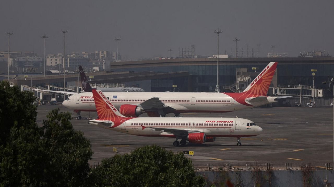 Air India passenger aircraft are seen on the tarmac at Chhatrapati Shivaji International airport in Mumbai. Credit: Reuters File Photo