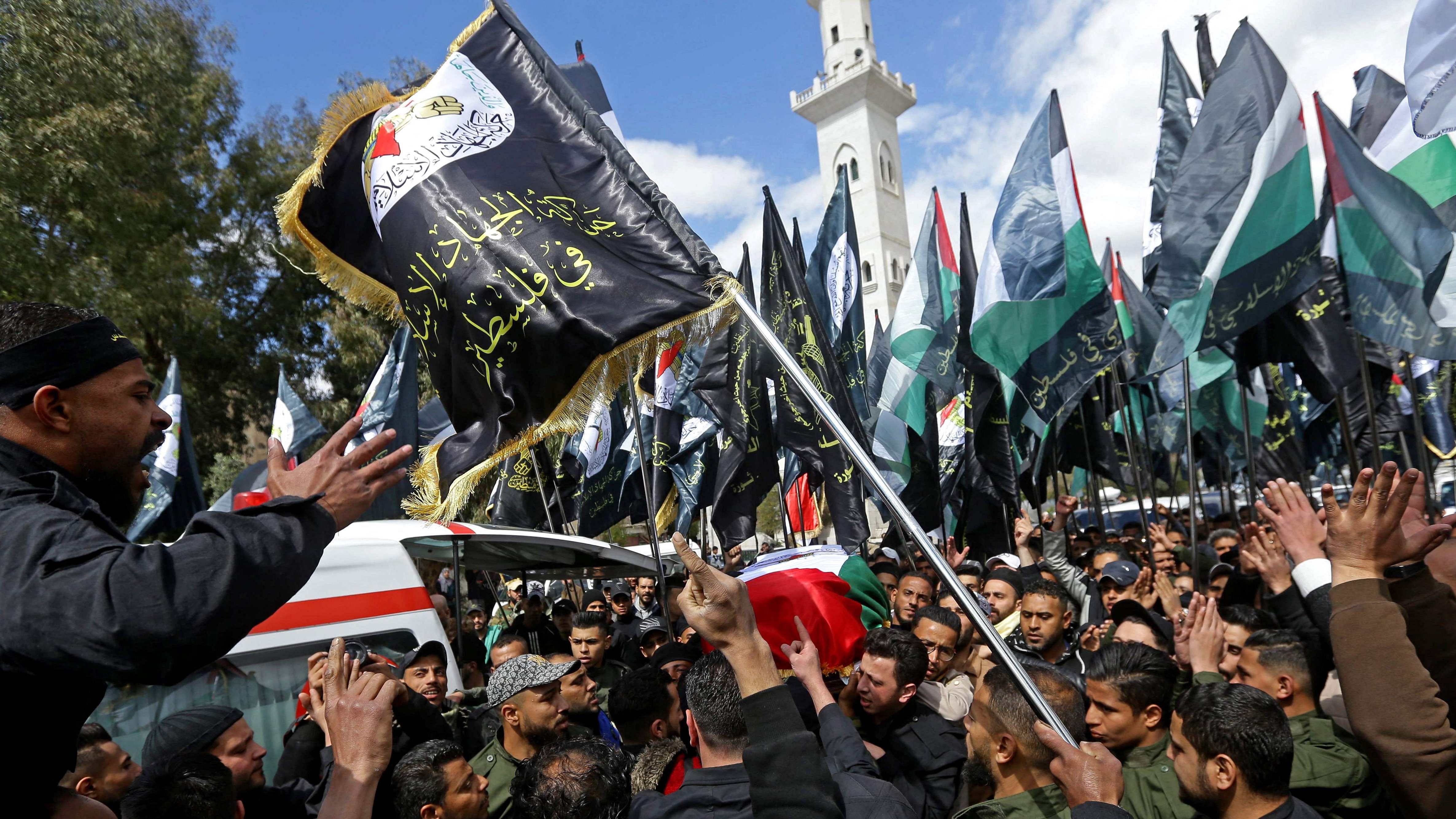 Mourners carry the coffin of Ali Ramzi al-Aswad, one of the commanders of Palestinian militant group Islamic Jihad, during his funeral in the countryside of Damascus on March 20, 2023. - Palestinian militant group Islamic Jihad said one of its commanders had been shot dead in Syria in an assassination it blamed on Israeli agents. Credit: AFP Photo