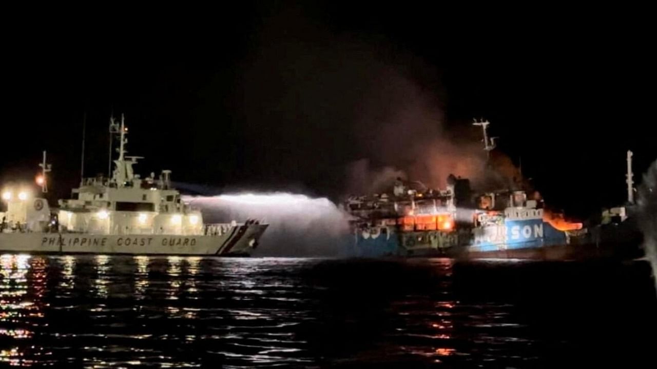 Philippine Coast Guard respond to the fire incident onboard M/V LADY MARY JOY 3 at the waters off Baluk-Baluk Island, Hadji Muhtamad, Basilan, Philippines, March 29, 2023. Credit: Reuters Photo