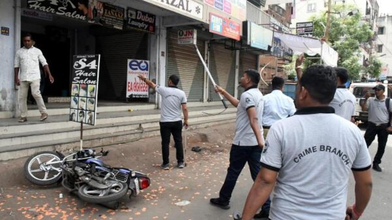 Police in action after stone-pelting on a Ram Navmi procession in Vadodara. Credit: PTI Photo
