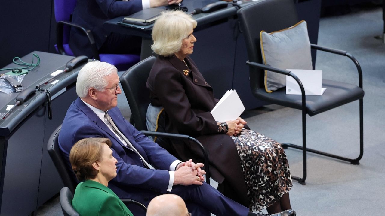 Germany's President Frank-Walter Steinmeier (L) and Britain's Camilla, Queen Consort (C) listen as Britain's King Charles III addresses the Bundestag (lower house of parliament) in Berlin, on March 30, 2023. Credit: AFP Photo