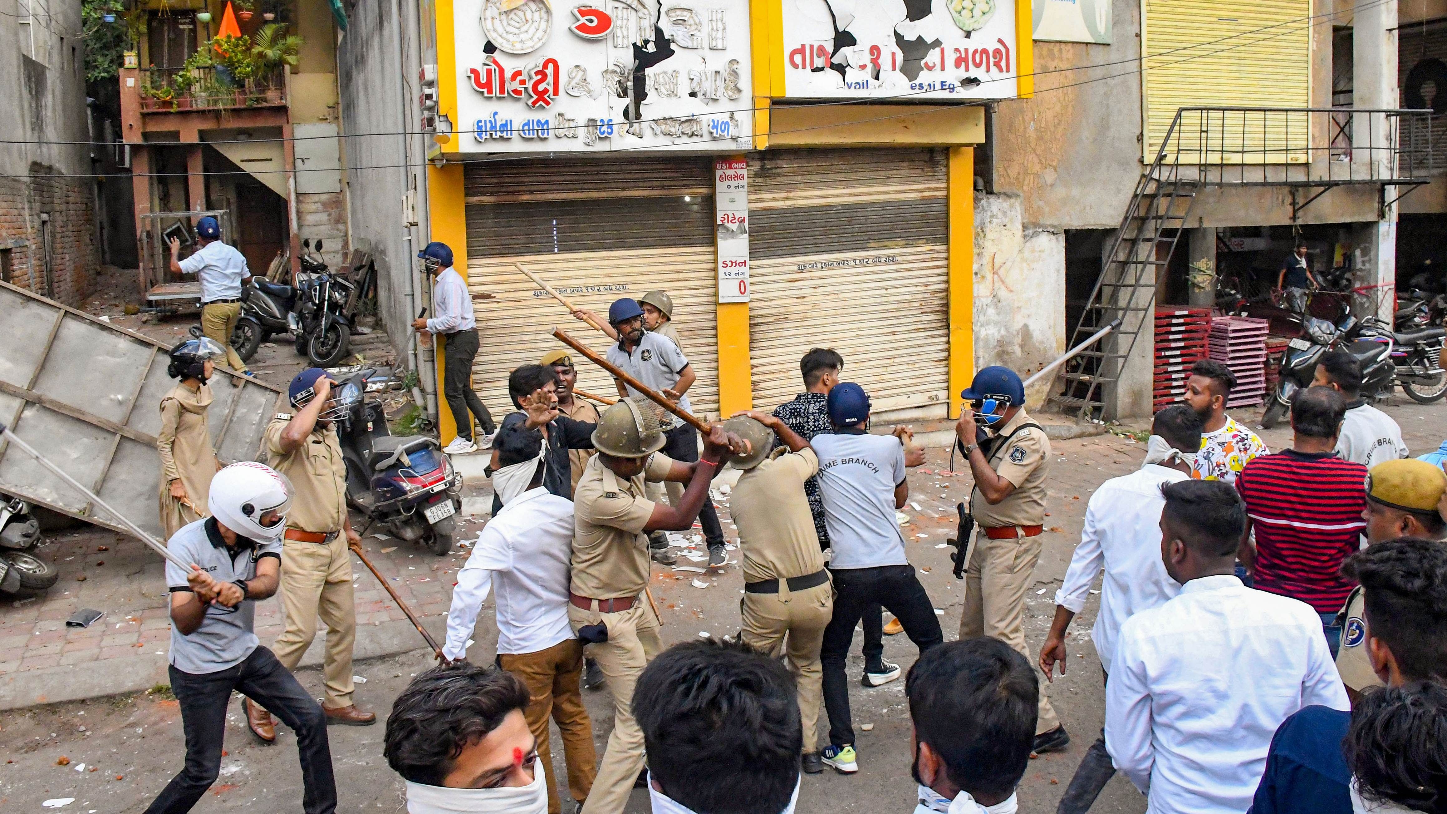 Police personnel deployed after incidents of stone pelting on a ‘Ram Navmi’ procession, in Vadodara. Credit: PTI Photo
