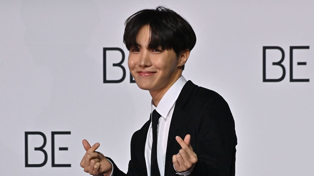 In this file photo taken on November 20, 2020, South Korean K-pop boy band BTS member J-Hope poses for a photo session during a press conference on BTS new album 'BE (Deluxe Edition)' in Seoul. Credit: AFP File Photo