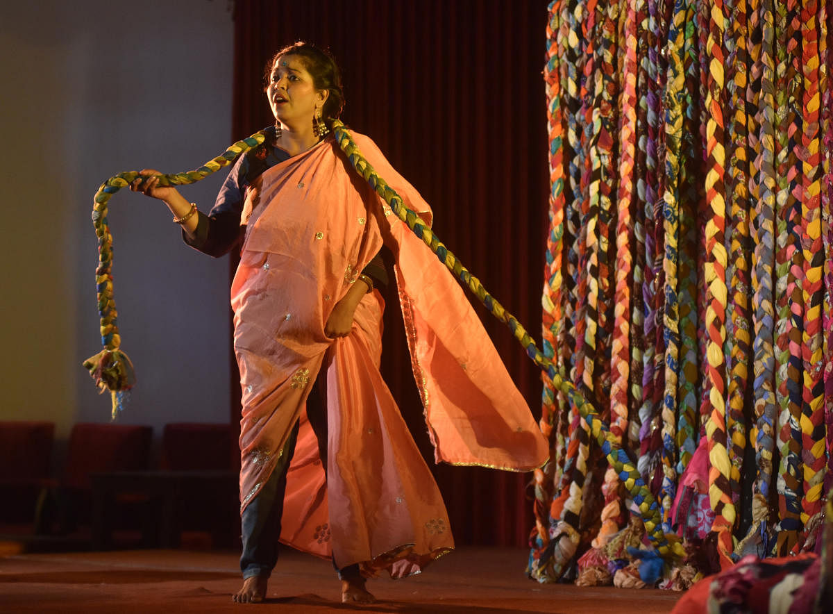 An artiste performs in the play depicting the life of transgender rights activist Akkai Padmashali at the High Court in Bengaluru on Saturday. Credit: DH Photo/B K Janardhan