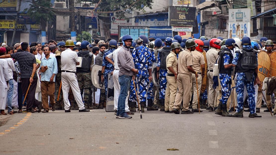 Howrah: Security personnel cordon off an area after clashes broke out between two groups during a 'Ram Navami' procession on Thursday, at Kajipara in Howrah district, Friday, March 31, 2023. Credit: PTI Photo