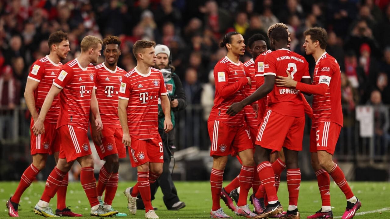 Bayern Munich's Kingsley Coman celebrates scoring their fourth goal with teammates. Credit: Reuters Photo