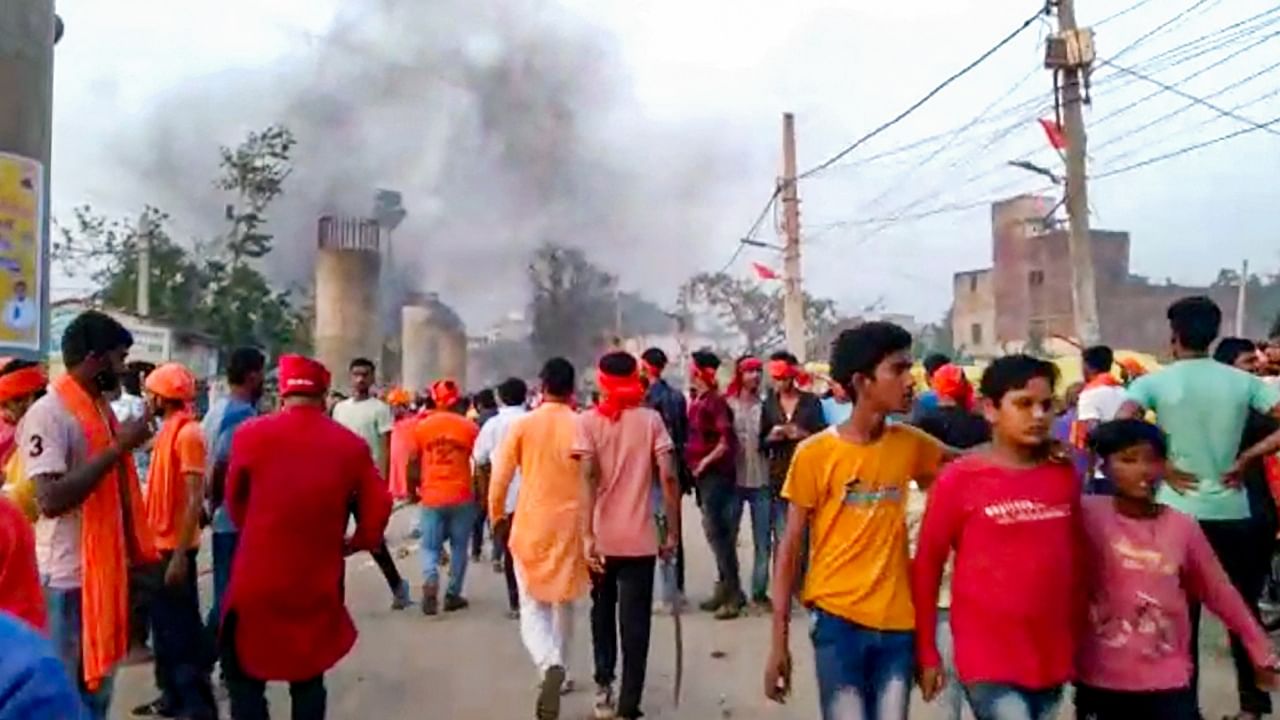 Locals at the site after clashes broke out between two groups during a procession a day after 'Ram Navami', in Nalanda district, Friday, March 31, 2023. Credit: PTI Photo