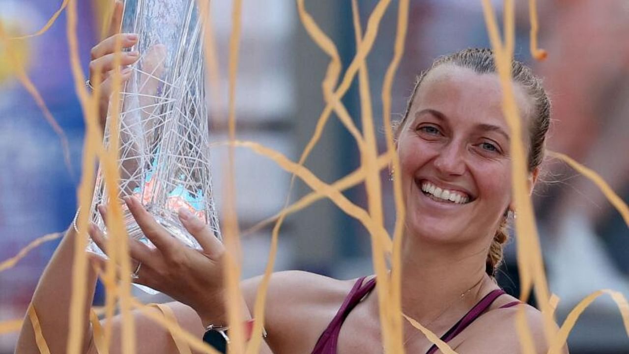 Petra Kvitova of Czech Republic poses with the Butch Buchholz Trophy after defeating Elena Rybakina of Kazakhstan during the Women's Final of the Miami Open at Hard Rock Stadium. Credit: Getty Images via AFP