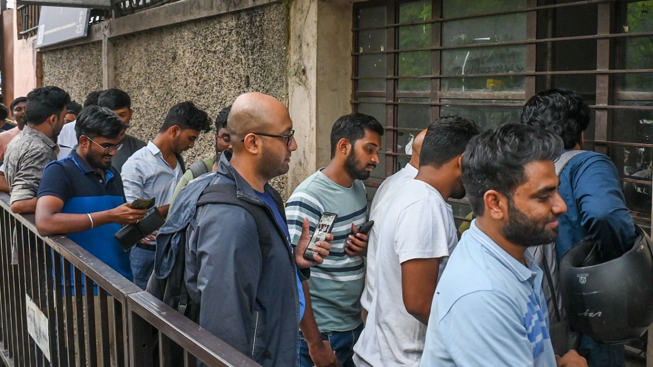 Cricket fans purchasing Sunday Royal Challengers Bangalore VS Mumbai Indians IPL Cricket Match ticket at Sri Chinnaswamy Stadium in Bengaluru. Credit: DH Photo