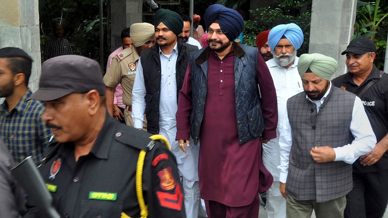 Congress leader Navjot Singh Sidhu leaves from his residence to meet the parents of singer Sidhu Moosewala to pay his condolences, in Patiala. Credit: PTI Photo