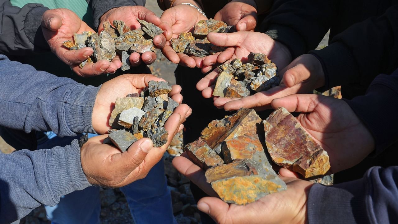 Villagers show lithium stones in the the Salal-Haimana area of Reasi district, where the Geological Survey of India (GSI) for the first time established 5.9 million tonnes of inferred resources of lithium, February 2023, in Reasi, Jammu & Kashmir. Credit: PTI File Photo