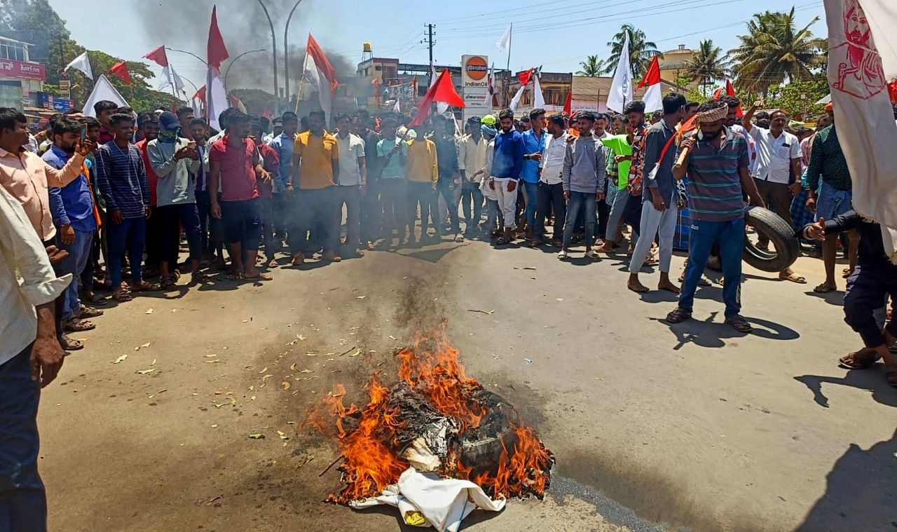 People belonging to Banjara community protest against the state cabinet's decision regarding internal reservation amongst the Scheduled Castes, in Shivamogga, March 27, 2023. Credit: PTI Photo