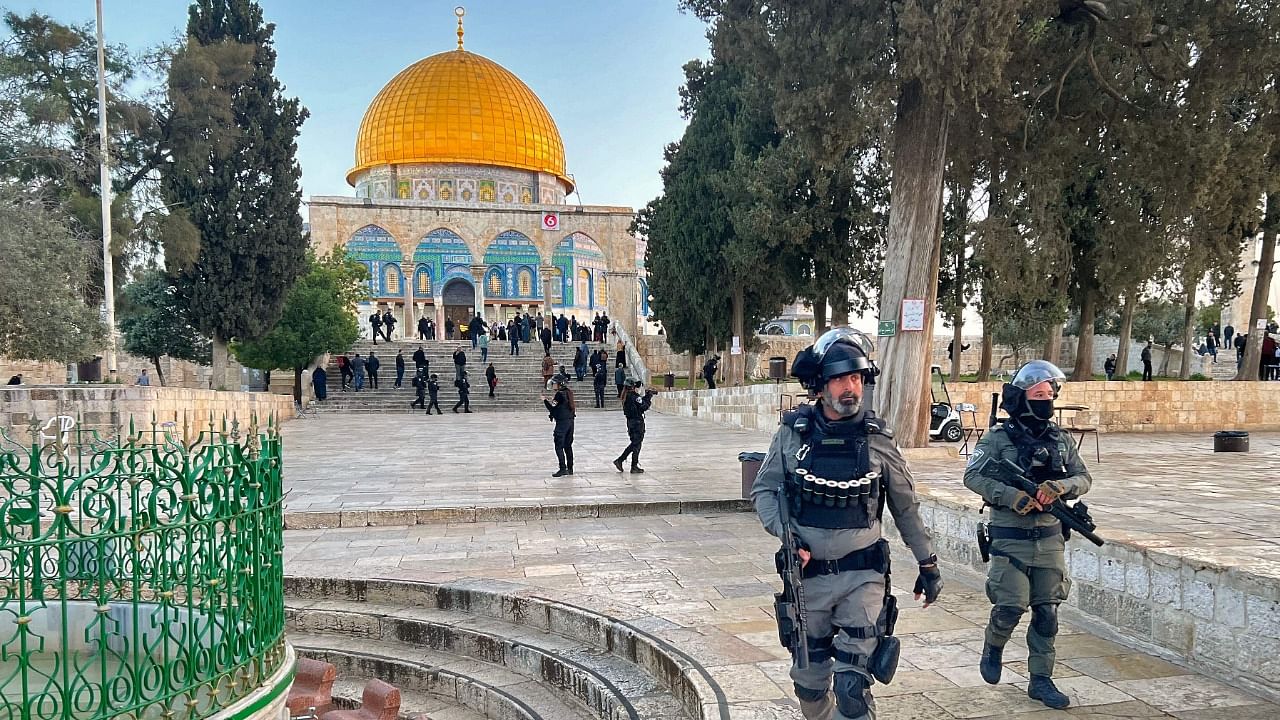 Israeli police walk inside the Al-Aqsa mosque compound in Jerusalem, early on April 5, 2023 after clashes erupted. Credit: AFP Photo