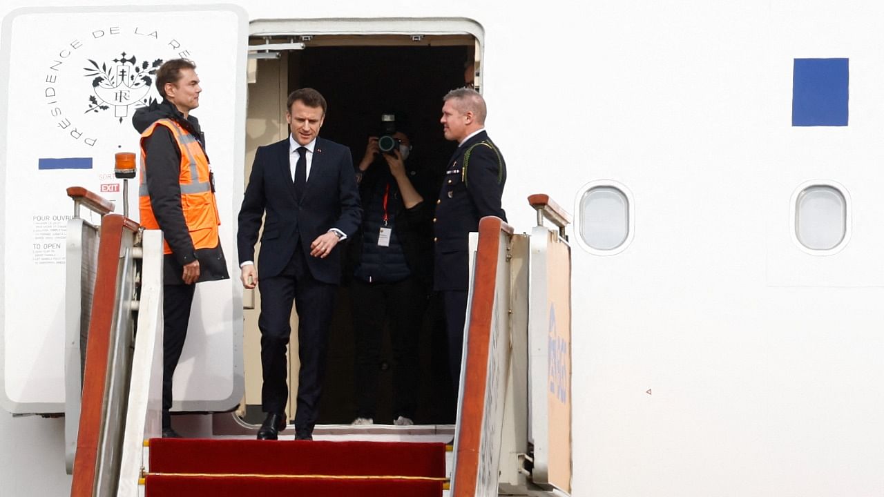 French President Emmanuel Macron arrives at Beijing Capital International Airport in Beijing on April 5. Credit: AFP Photo