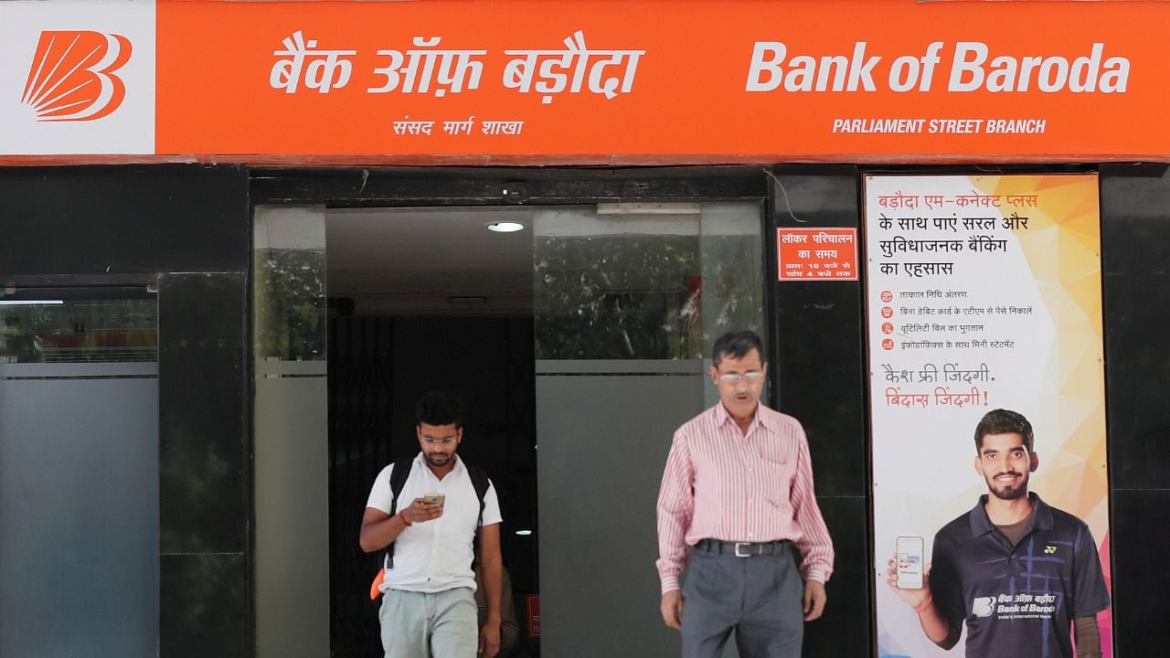 People walk out from Bank of Baroda in New Delhi. Credit: Reuters File Photo