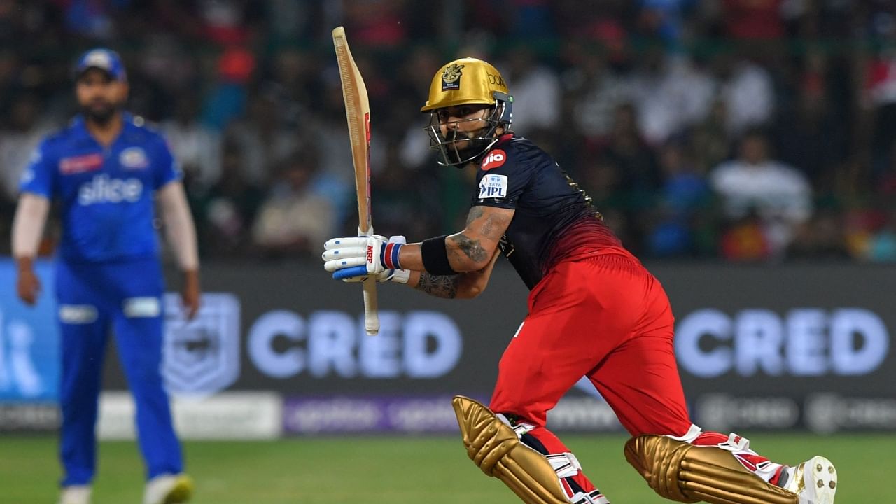 Royal Challengers Bangalore's Virat Kohli plays a shot during the match with Mumbai Indians at the Chinnaswamy Stadium in Bengaluru on April 2, 2023. Credit: AFP Photo