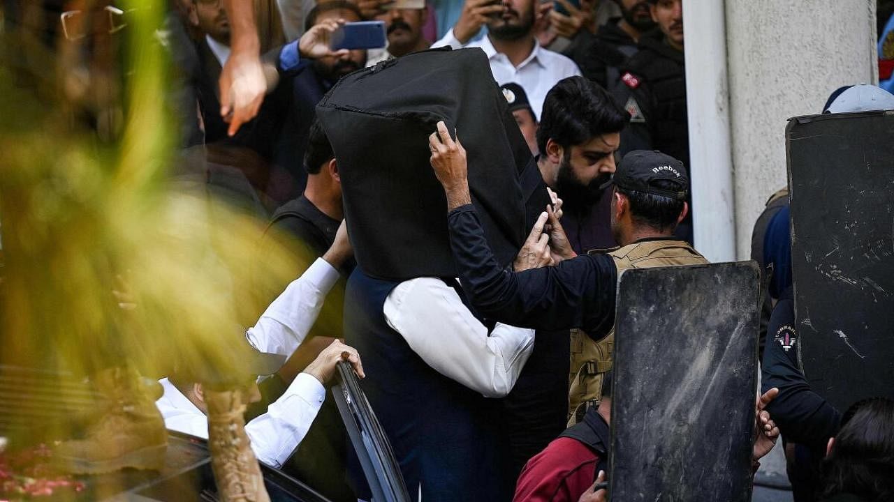 Imran Khan being taken into a Lahore court. Credit: AFP Photo