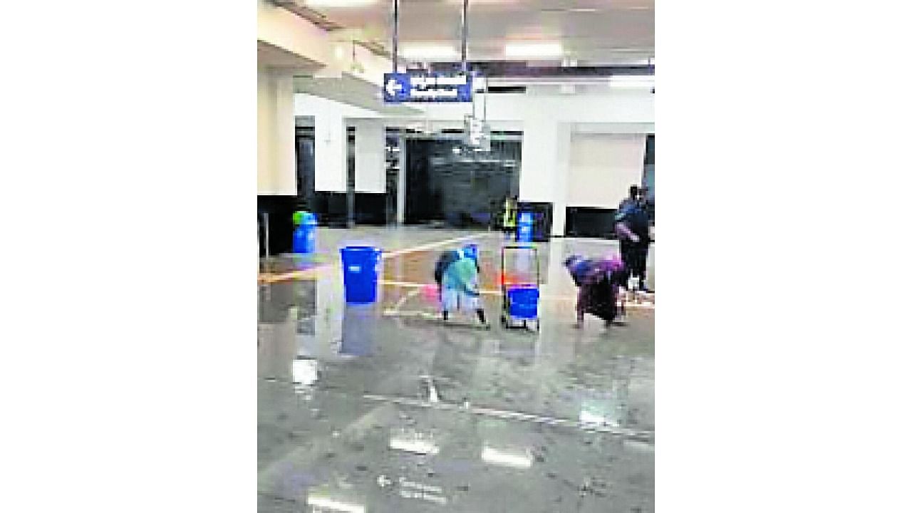 Passengers had to watch their steps as rainwater entered the paid area (ticket counter and beyond). Credit: Special arrangement