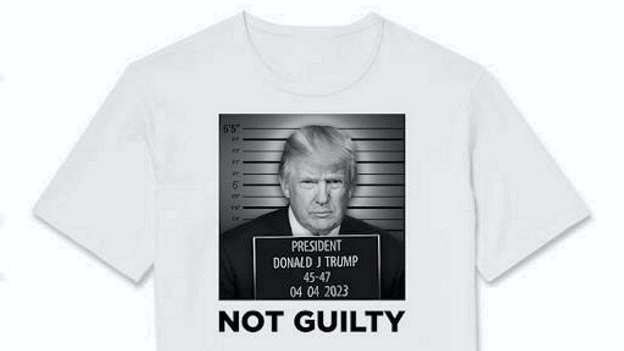 A T-shirt featuring a specially-created mug shot of former US president Donald Trump, with the message ‘Not Guilty’, which is being marketed by his re-election campaign. Credit: PTI Photo