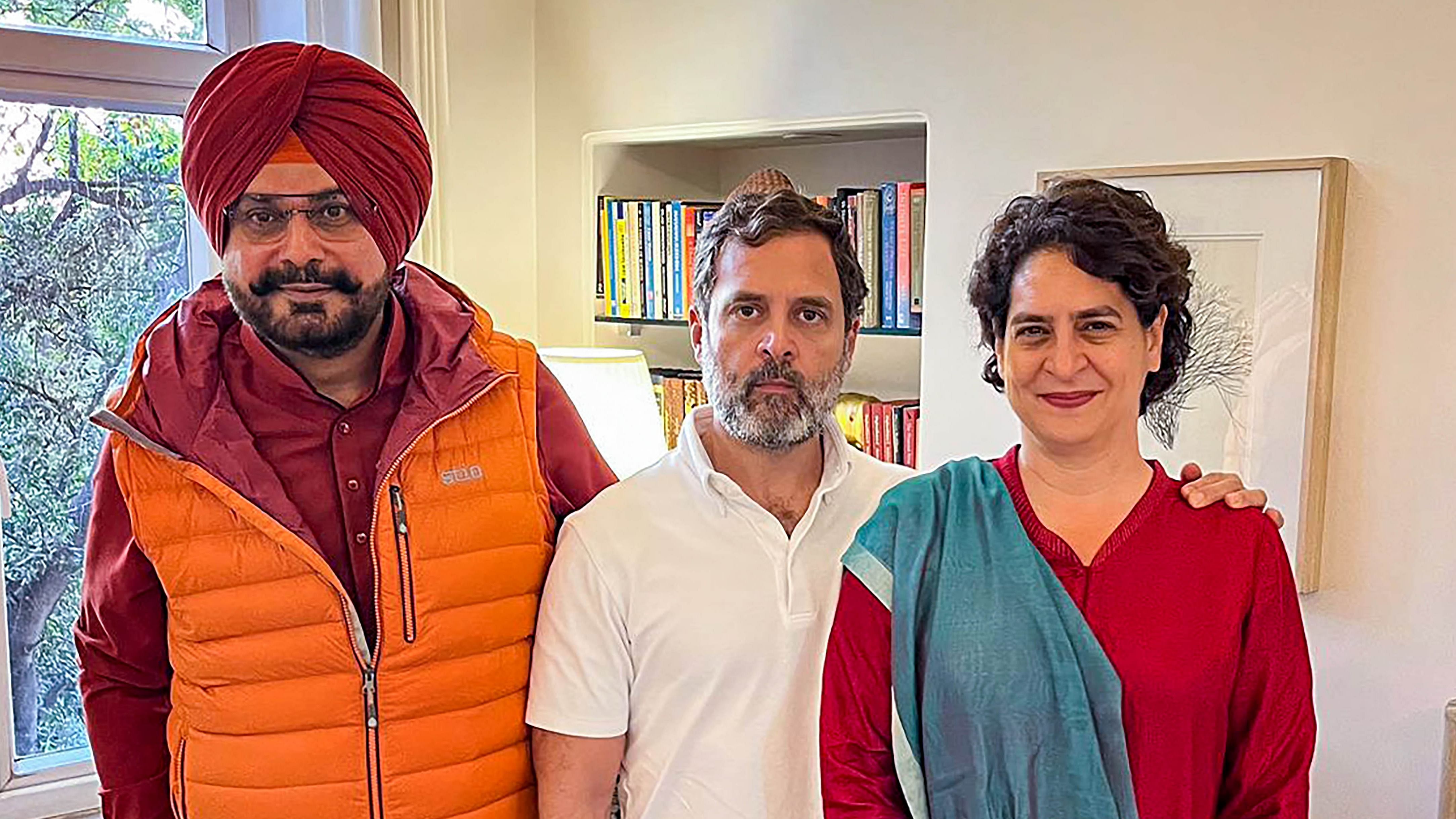  Congress leader Navjot Singh Sidhu meets party leaders Rahul Gandhi and Priyanka Gandhi Vadra in New Delhi. Credit: PTI Photo