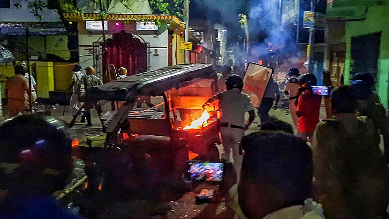 Police deployed in large numbers after a clash broke out between two groups during Ram Navami procession, in Hooghly district, Sunday evening, April 2, 2023. Credit: PTI Photo