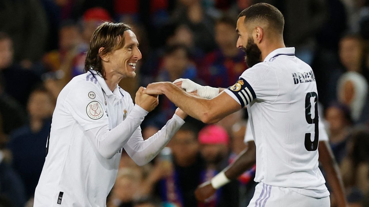 Luka Modric (L) and Karim Benzema (R). Credit: Reuters Photo