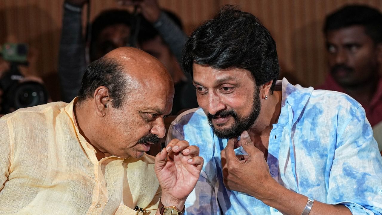 Karnataka Chief Minister Basavaraj Bommai with Kannada actor Kichha Sudeep in Bengaluru, Wednesday, April 5, 2023. Credit: PTI Photo