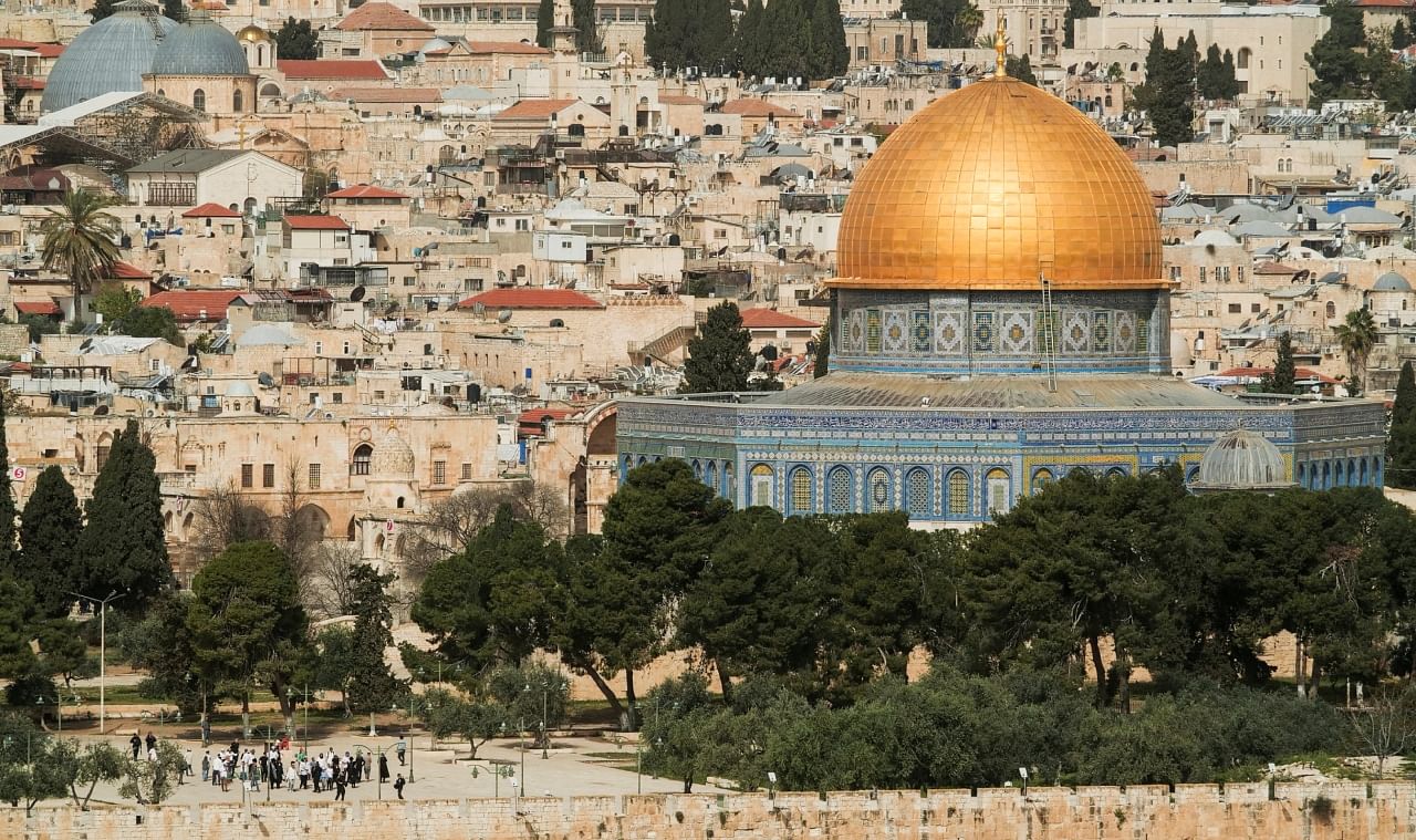 A photo taken from the Mount of Olives shows a group of Jewish visitors on the Al-Aqsa compound, also known to Jews as Temple Mount, in Jerusalem's Old City, April 9, 2023. Credit: Reuters Photo